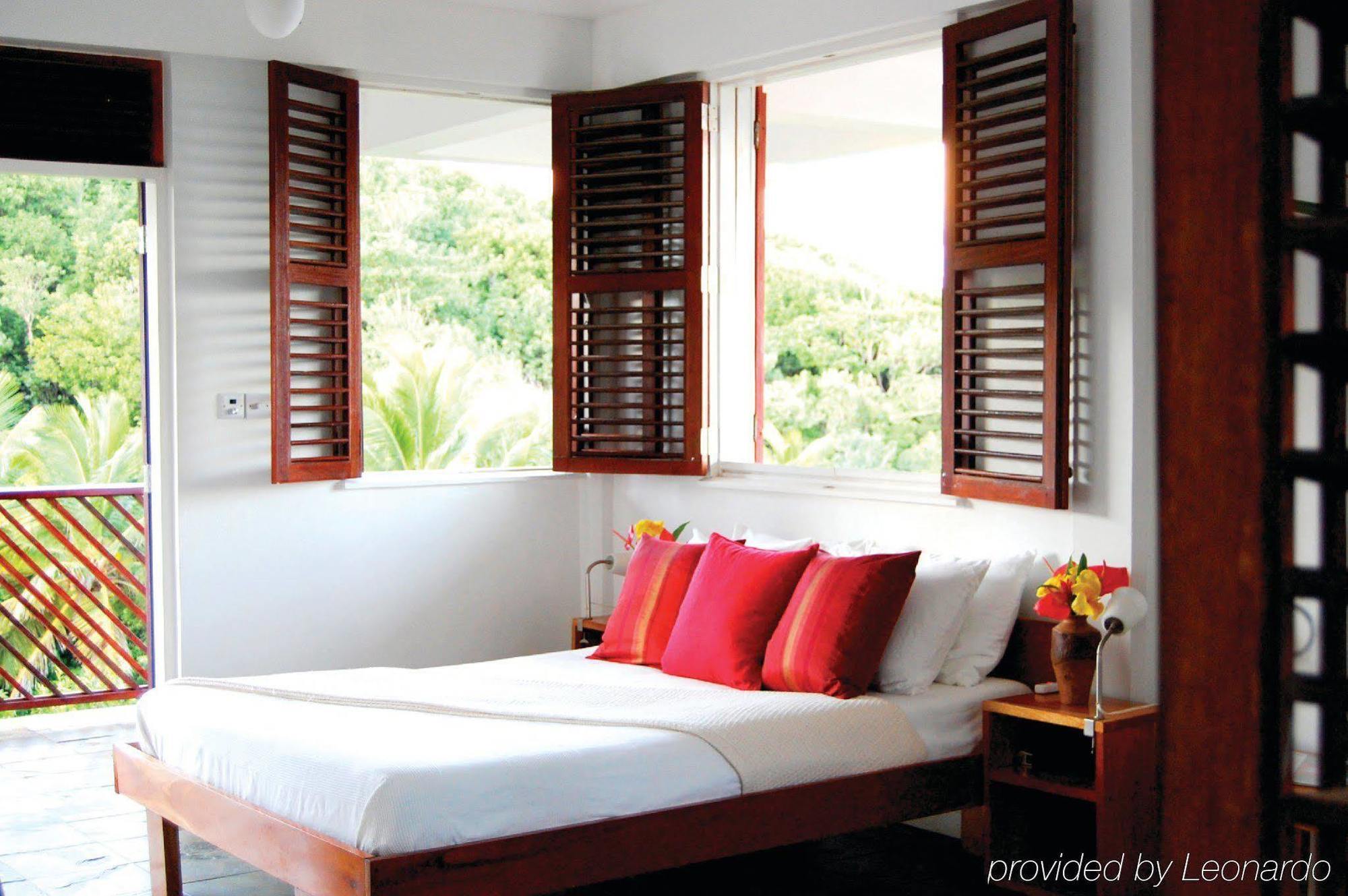 Calibishie Cove Quarto foto